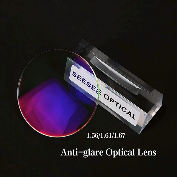 An anti-glare driving lens with a purple residual reflection standing in a clear acrylic block engraved Seesee Optical, labelled 1.56, 1.61, 1.67
