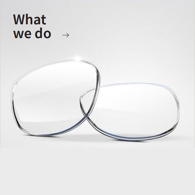 Two clear uncut freeform lenses leaning against each other on a white surface, captioned What we do