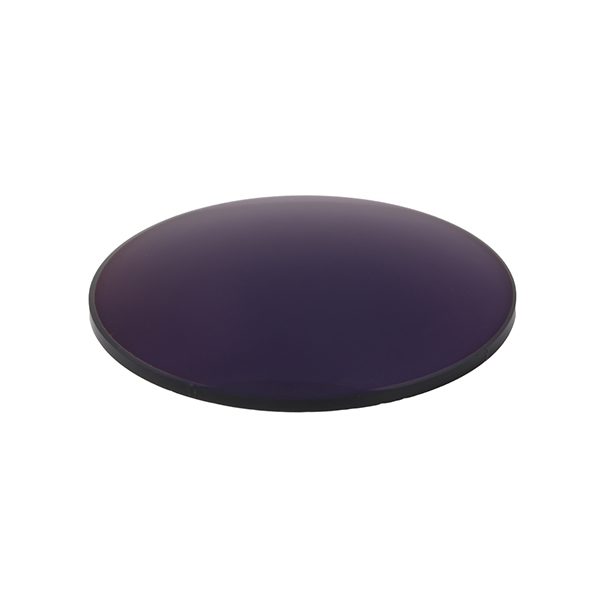 A darkened grey photochromic lens on a white background